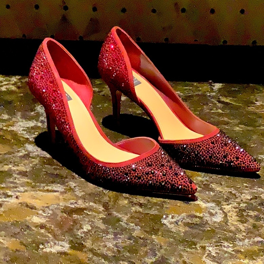 Red and black jeweled pumps